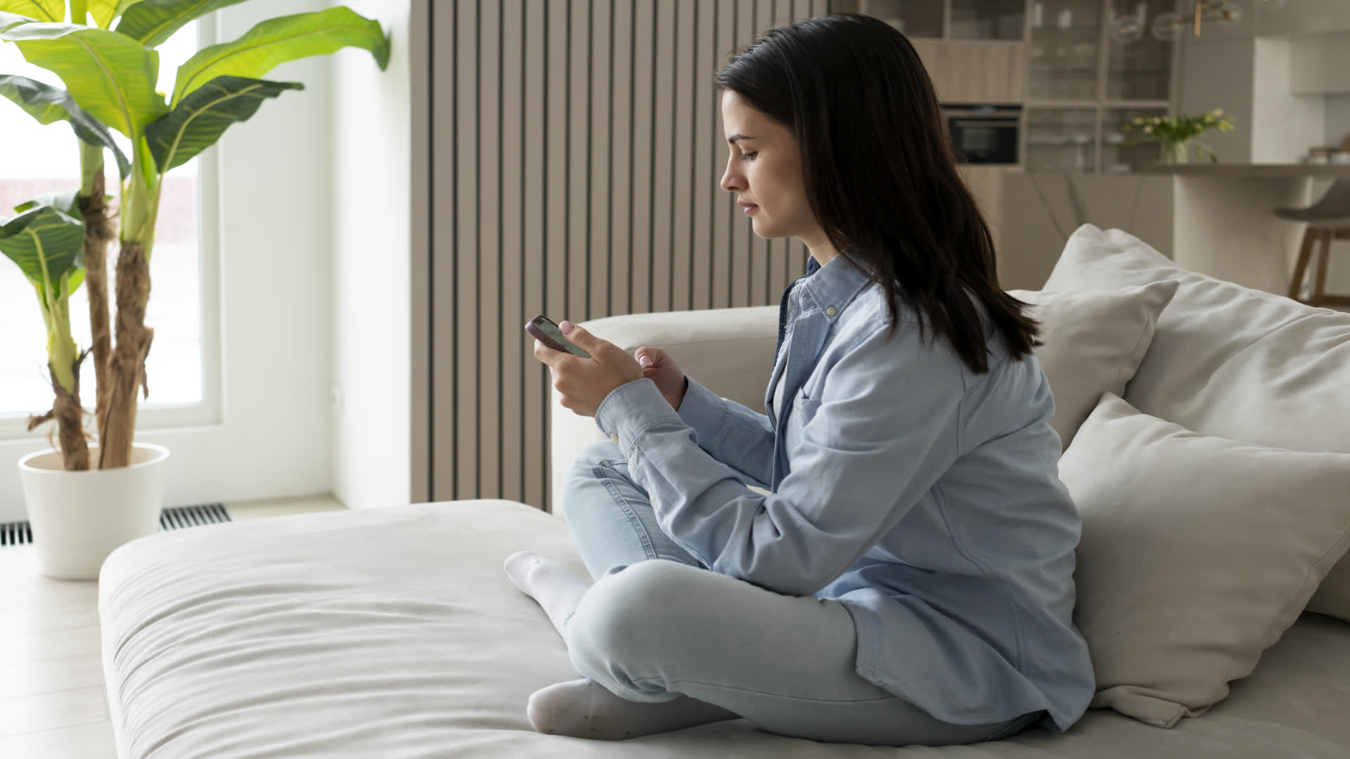 Patient looking at phone closely
